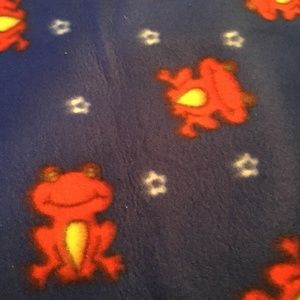 Fleece fabric. Royal blue with red frogs. 29”x60”